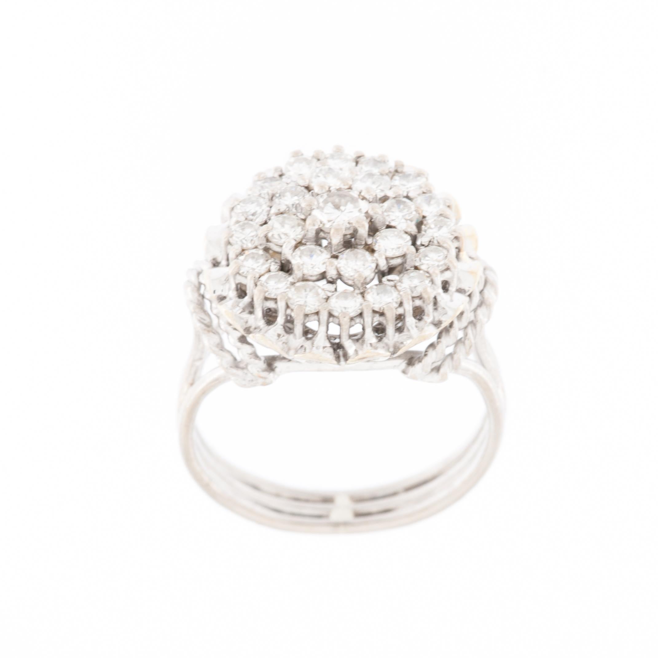 Gorgeous italian Cocktail Ring in 18kt White Gold set with brilliant-cut white Diamonds. The ring is undoubtedly the woman's most personal jewel and brings a touch of elegance to every movement of the hand. 
This marvelous ring has an 