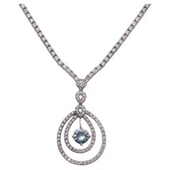 Collana vintage in oro bianco 18KT con diamanti e acquamarina