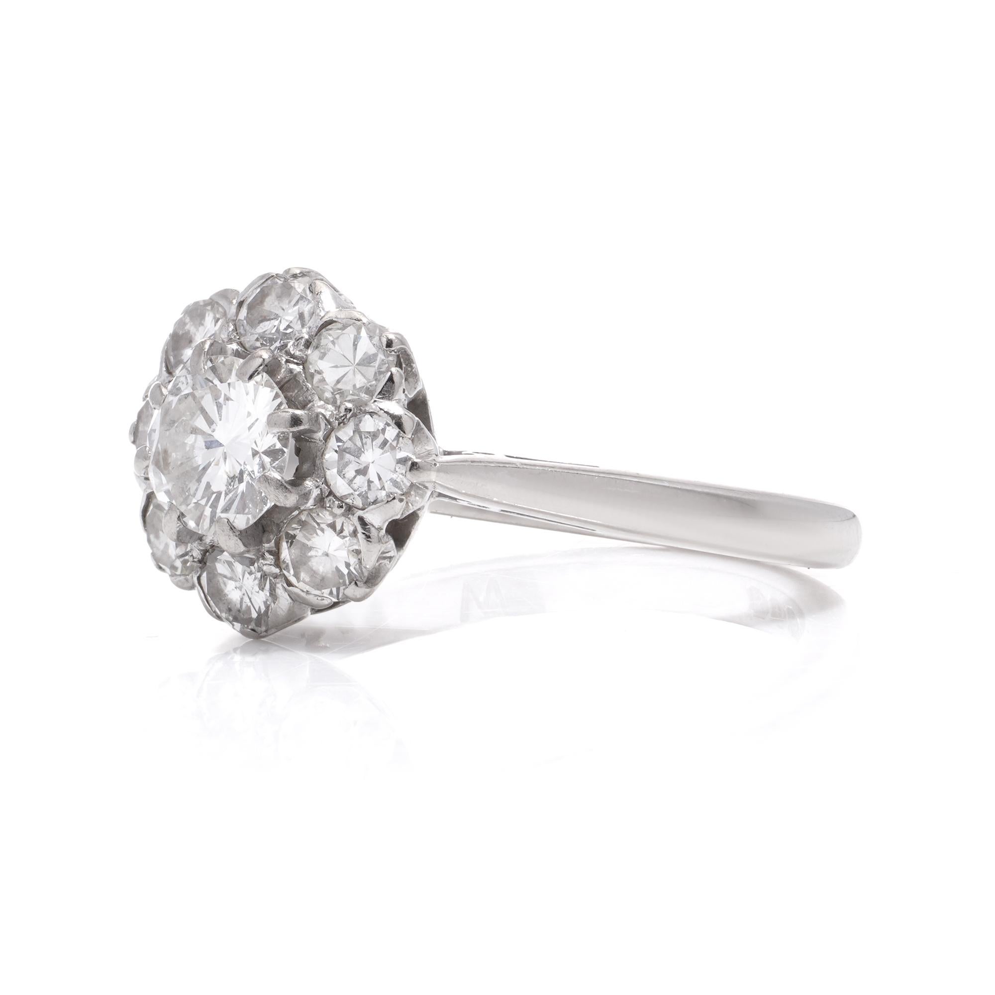 Brilliant Cut Vintage 18kt white gold flower head 1.46 cts. of diamond cluster ring For Sale