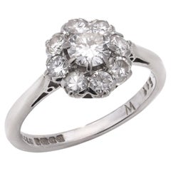 Retro 18kt white gold flower head 1.46 cts. of diamond cluster ring
