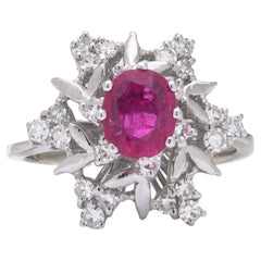 Vintage 18kt white gold ruby and diamond cluster ring Vintage 18kt white gold ruby and diamond cluster ring