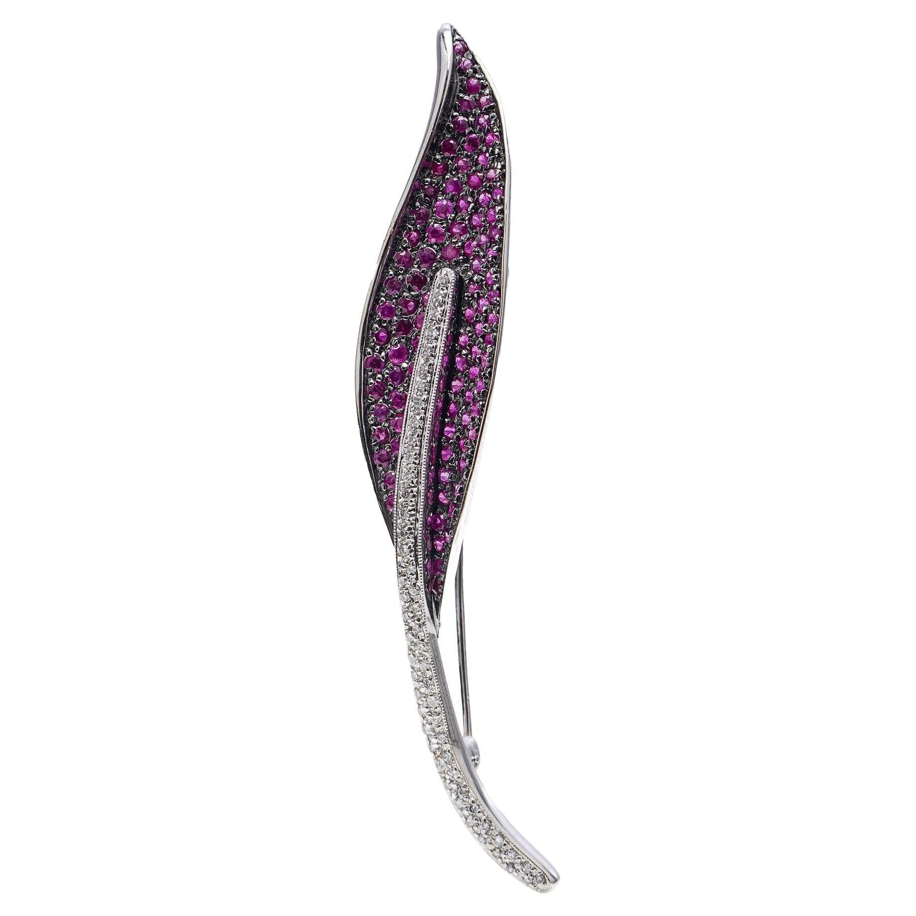 Vintage 18kt. white leaf-shaped brooch, set with rubies and diamonds