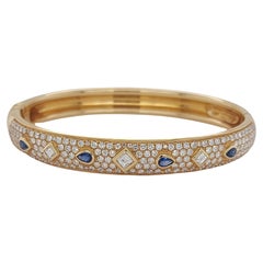 Vintage 18kt Yellow Gold Cartier Bangle Bracelet with Sapphire & Diamonds