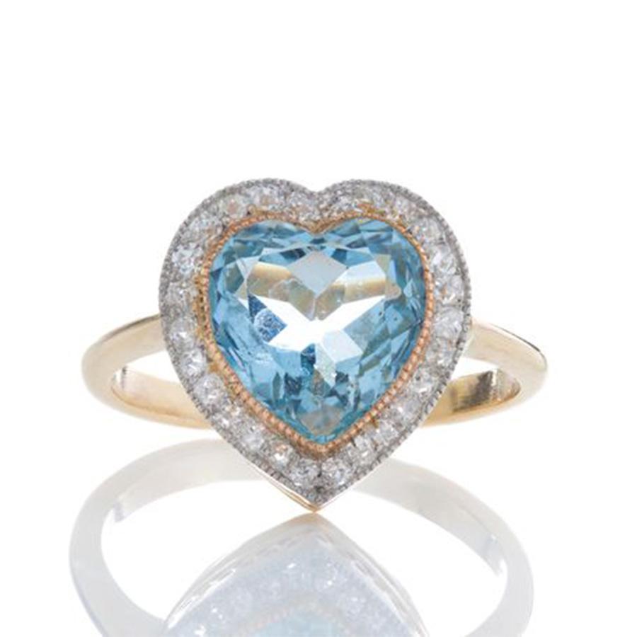 Antique Edwardian  18kt yellow gold ladies ring with heart cut Aquamarine and diamonds. 
Made in England.
Tested positive for 18kt gold.

Please note: Shank has been added later in 1950's.
Dimensions - 
Ring Size (UK) = N (EU) = 54 (US) = 7
Weight: