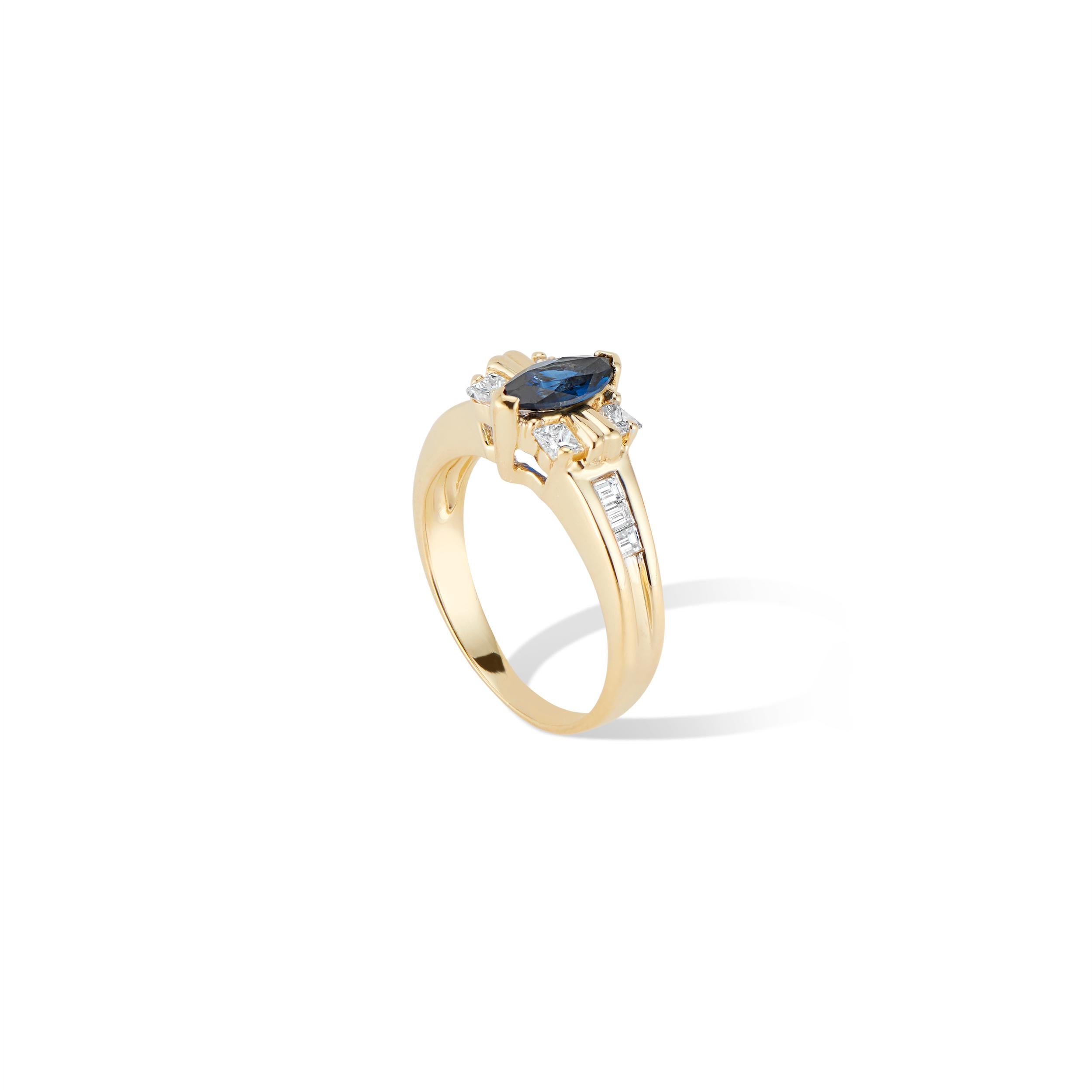 Beautiful Vintage 18kt Yellow Gold Sapphire and Diamond ring from the 1970’s era.
Featuring a .50ct Marquise Sapphire, with 2 princess cut diamonds on each side with a unique gold ridge detail and 3 diamond baguettes down each side of the band.
A