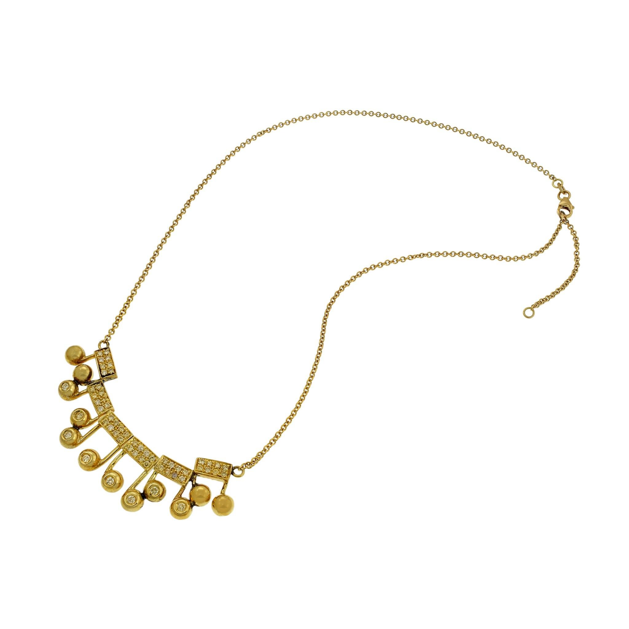 This charming vintage necklace features musical note charms, each set with sparkling diamonds. Crafted in 18KT yellow gold, the necklace showcases a total of 1.00 carat of diamonds with F-G color and VS clarity. Weighing 15.15 grams, this unique