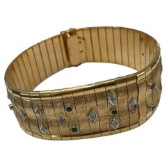 Vintage 18-karat Yellow Gold Semi-Rigid Bracelet with White and Green Stones