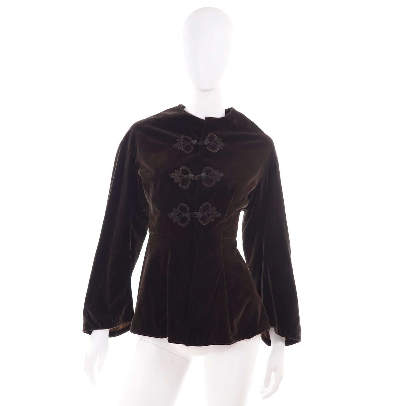 This is an absolutely beautiful Edwardian basque style women's jacket with a peplum and fun trumpet sleeves. We love Victorian and Edwardian jackets and coats, and this one is very wearable and easy to add to a modern wardrobe. This very special