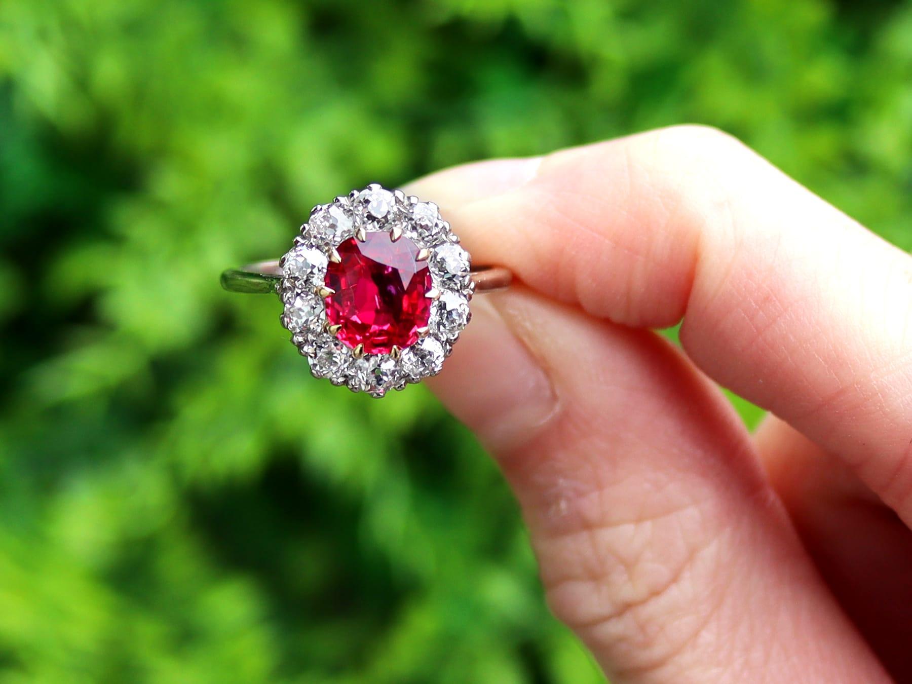 A stunning, fine and impressive vintage 1.90 carat Thai ruby and 0.90 carat diamond, platinum and 18 karat yellow gold cluster ring; part of our collection of vintage ruby rings.

This stunning, fine and impressive vintage cluster ring has been