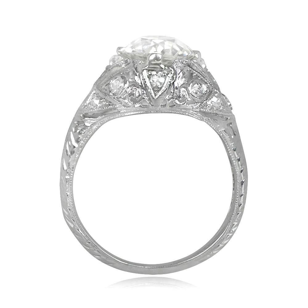 Step into the opulent world of Art Deco with this magnificent vintage ring. Its focal point is a mesmerizing 1.90 carat old European cut diamond, boasting a warm L color and striking VS1 clarity, securely set in elegant prongs. The dome-shaped