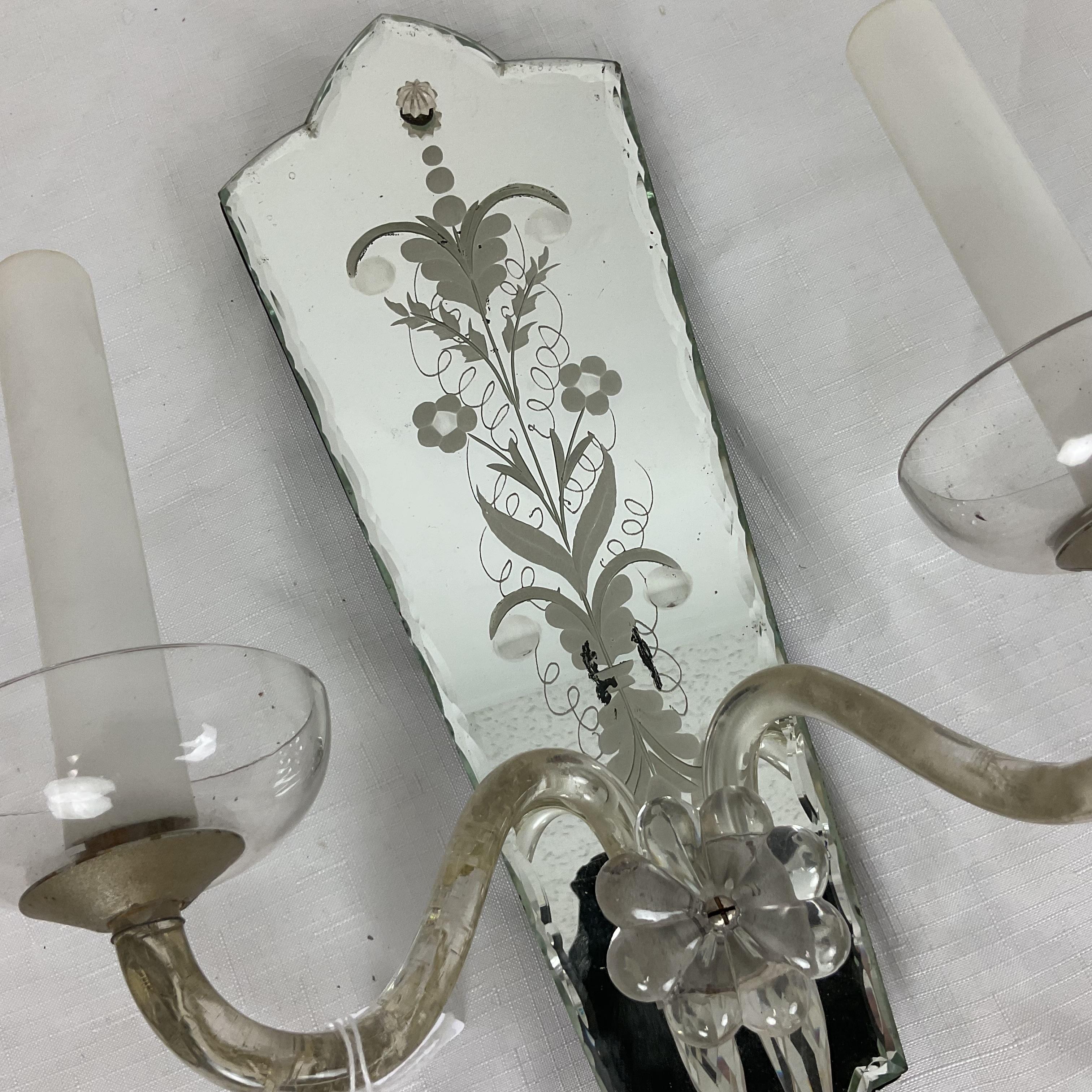 Originally made for candles, elegantly etched and carved mirror back sconces with blown glass original arms and cups, electrified.