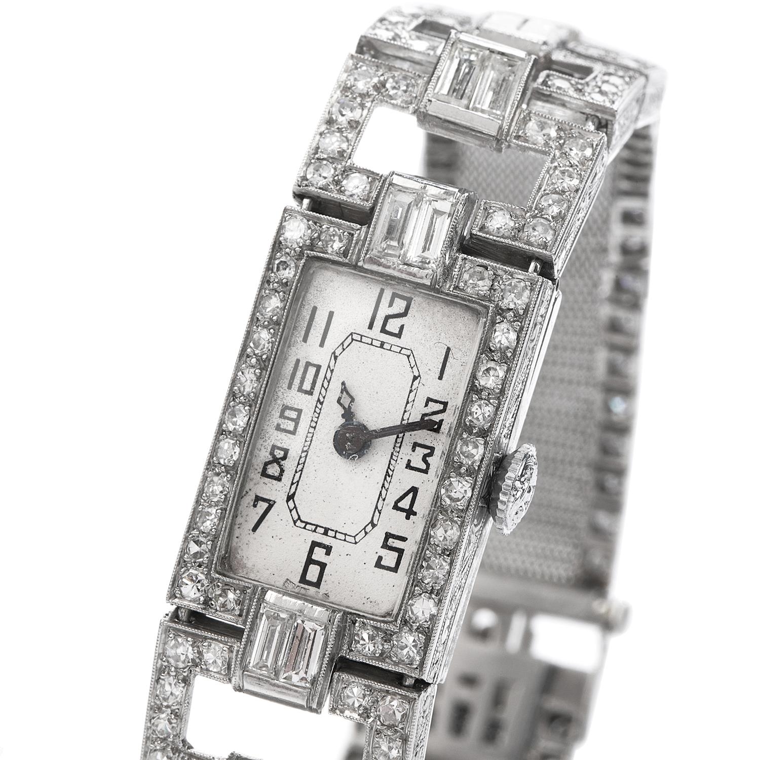 This timeless Antique art deco Ladies diamond watch, crafted in sensual 42.8 grams of platinum. This mesh link flexible watch was created in 1920's era.   Featuring 16 larger  bagguet cut Diamonds and 168 round faceted icy white Diamonds