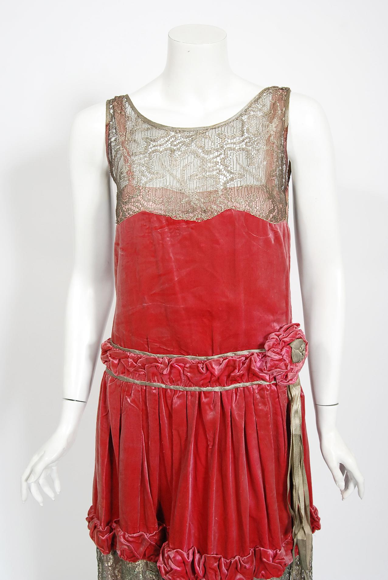 A gorgeous 1920's magenta pink dress by 'Bedell of New York' which was one of the high-end custom boutiques operating during the Art-Deco era. Vibrant flapper dresses from this decade are perennial favorites and this one is a show-stopper. The