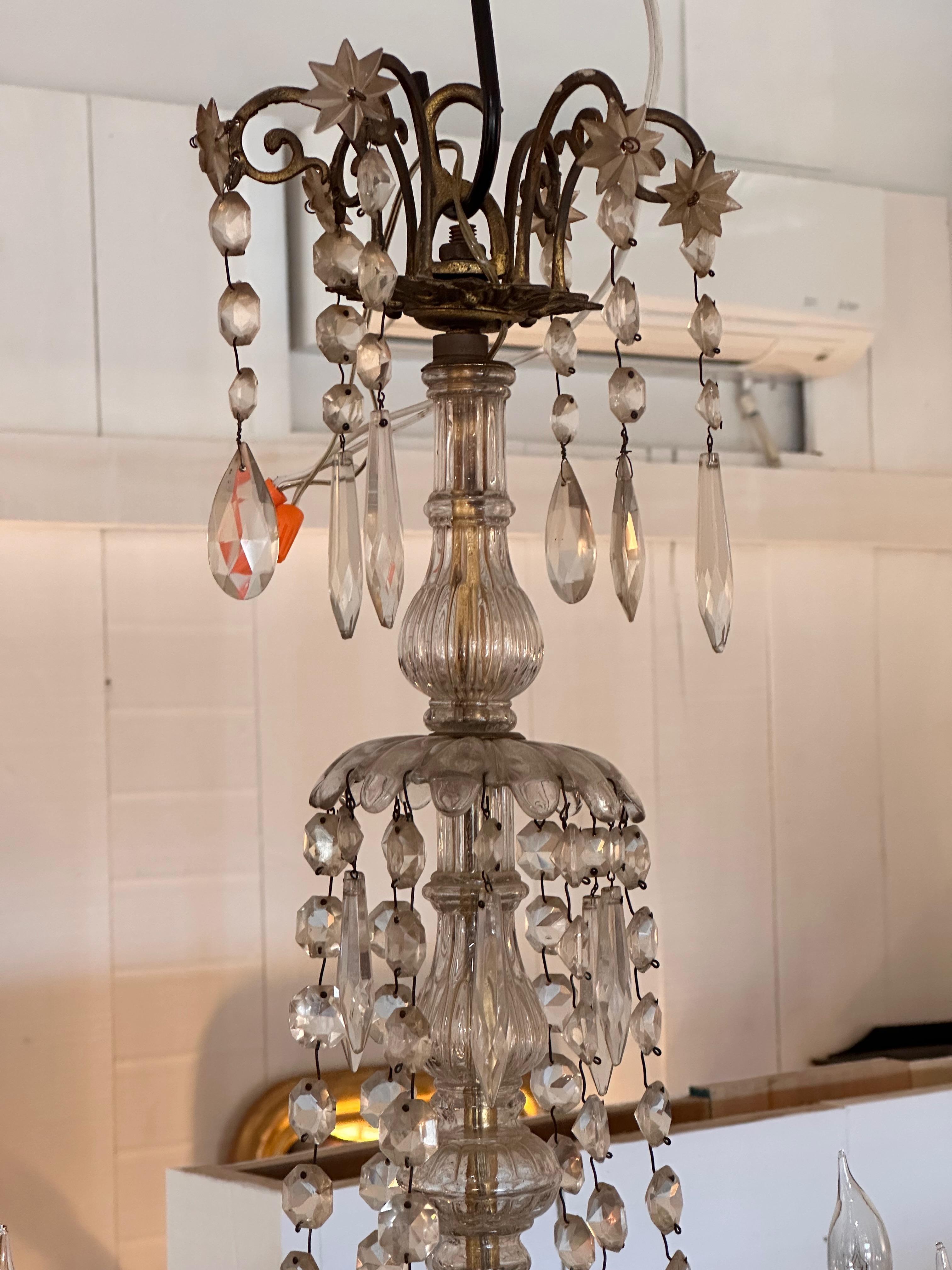 Lots of glam with this chandelier.
Dress up your room. Made in the 1920s.