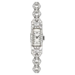 Reloj de pulsera de cóctel de platino con esfera de plata engastada con diamantes de los años 20 vintage
