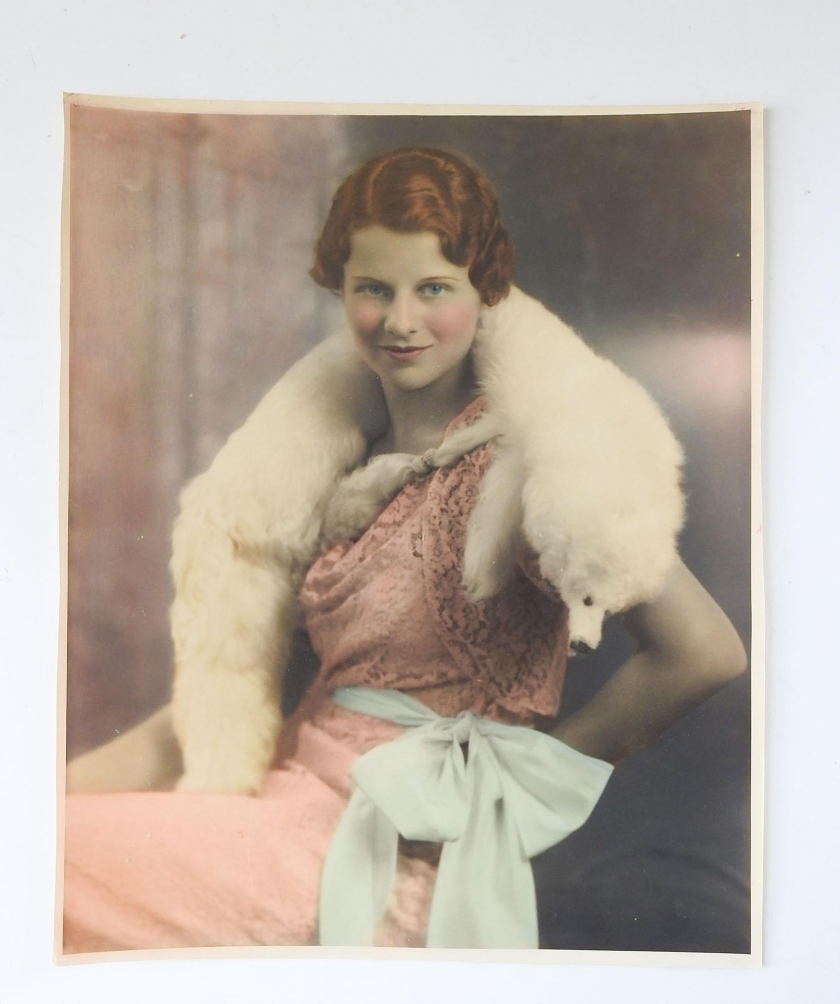 Vintage circa 1920's hand tinted portrait photograph of glamourous woman in lace and furs.  Unsigned.  Unframed, corner bumps.