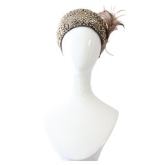Vintage 1920's Silver Lamé Cloche hat 1920's flapper hat rhinestone and feather