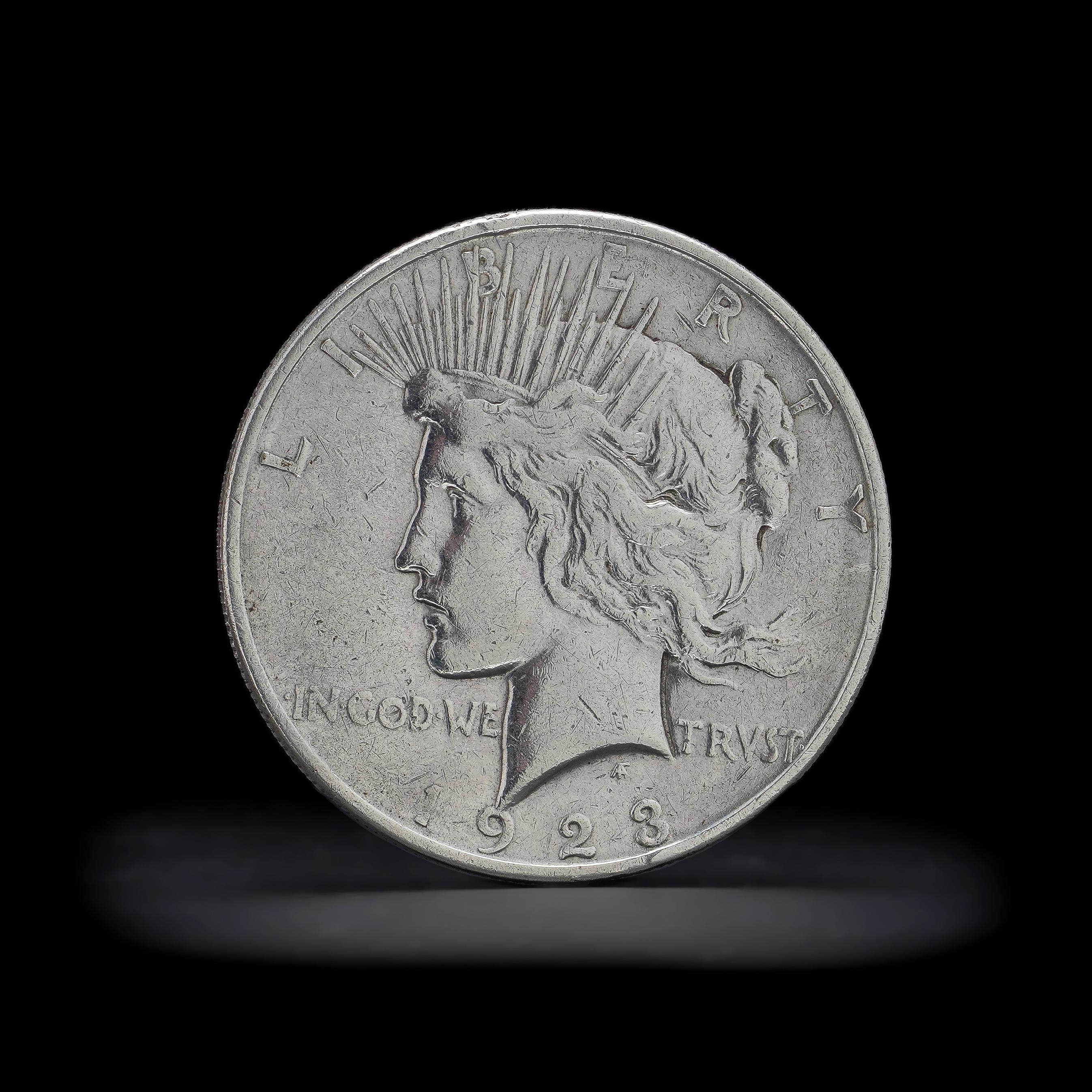 1923 silver dollar in god we trvst