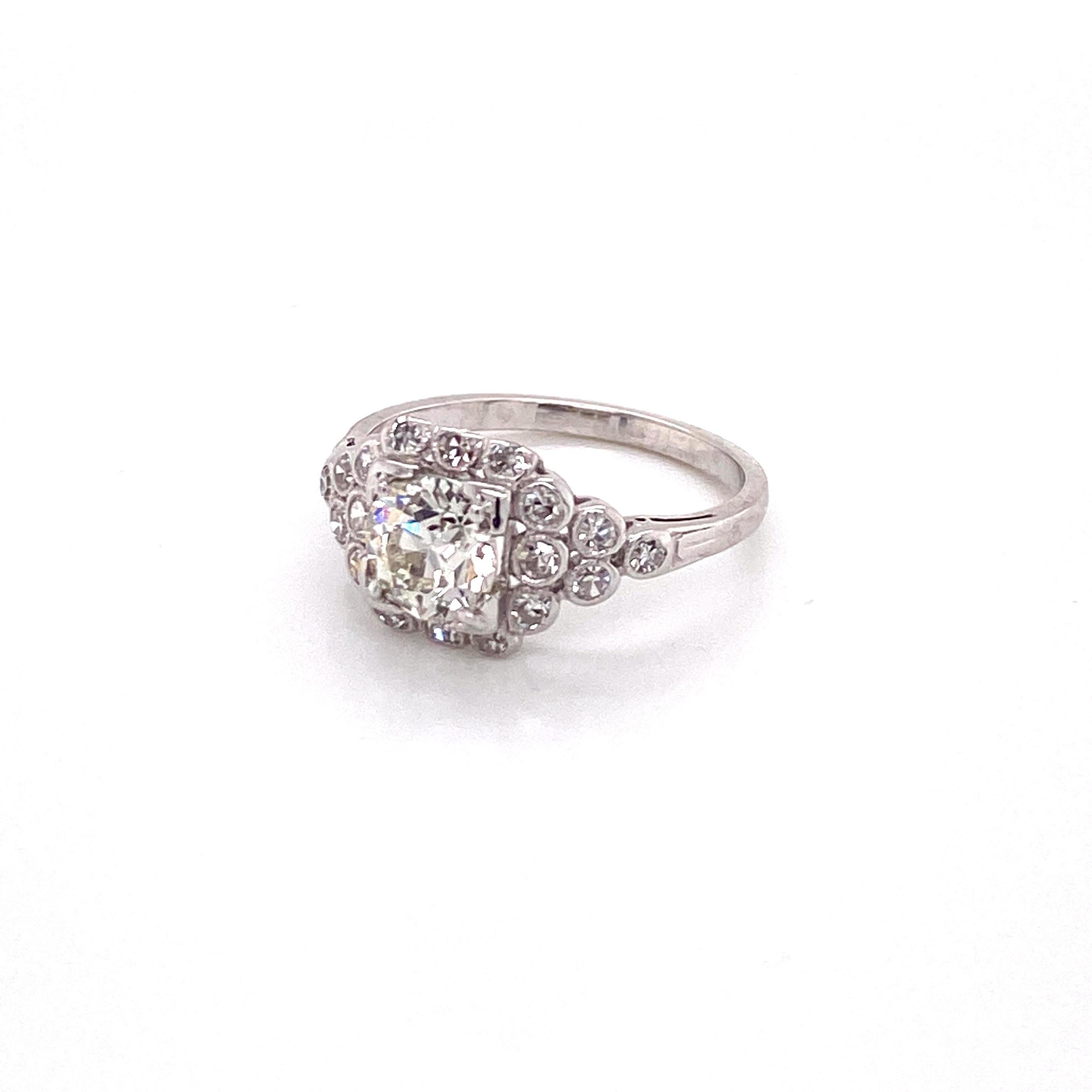 Vintage 1930s 1.00 Carat European Cut Diamond Platinum Ring with Bezel Set Halo In Fair Condition In Boston, MA