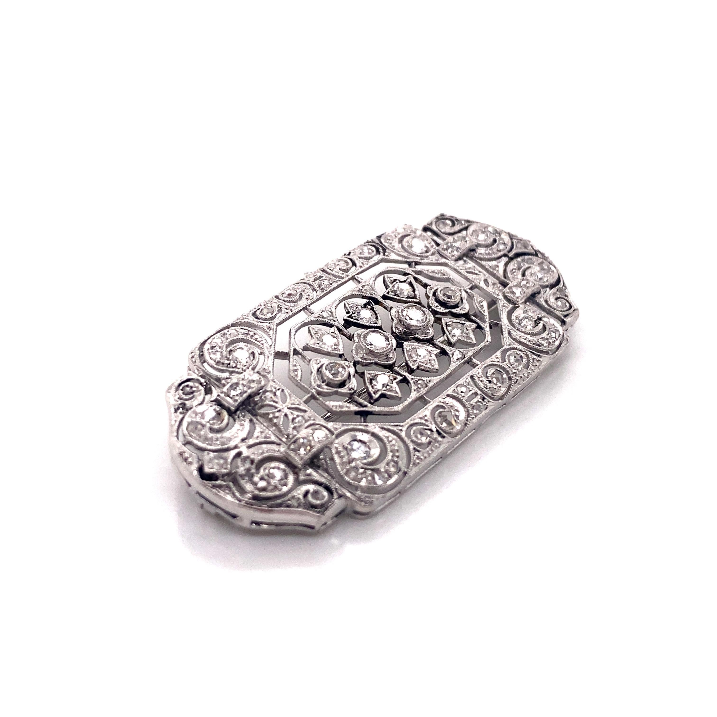 Vintage 1930’s 18K White Gold Art Deco Diamond Brooch - The brooch contains 102 single cut, rose cut and full cut round diamonds that weigh approximately 1ct total weight. The diamond quality is H - I color and VS1 - SI1 clarity. The brooch has very