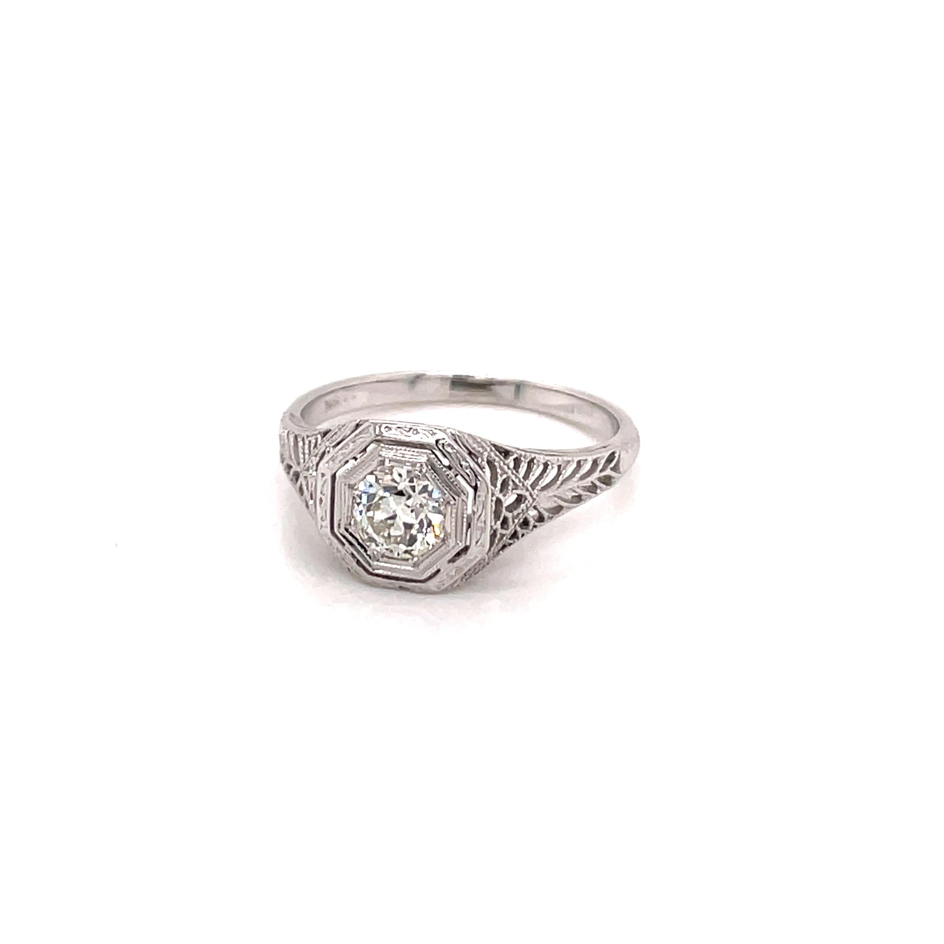 Vintage 1930s 18KW .50ct European Cut Diamond Filigree Art Deco Engagement Ring - The center diamond weighs approximately .50ct with K color and VS1 clarity. The diamond is set with 8 prongs in an 18K white gold Art Deco octagon setting. The setting