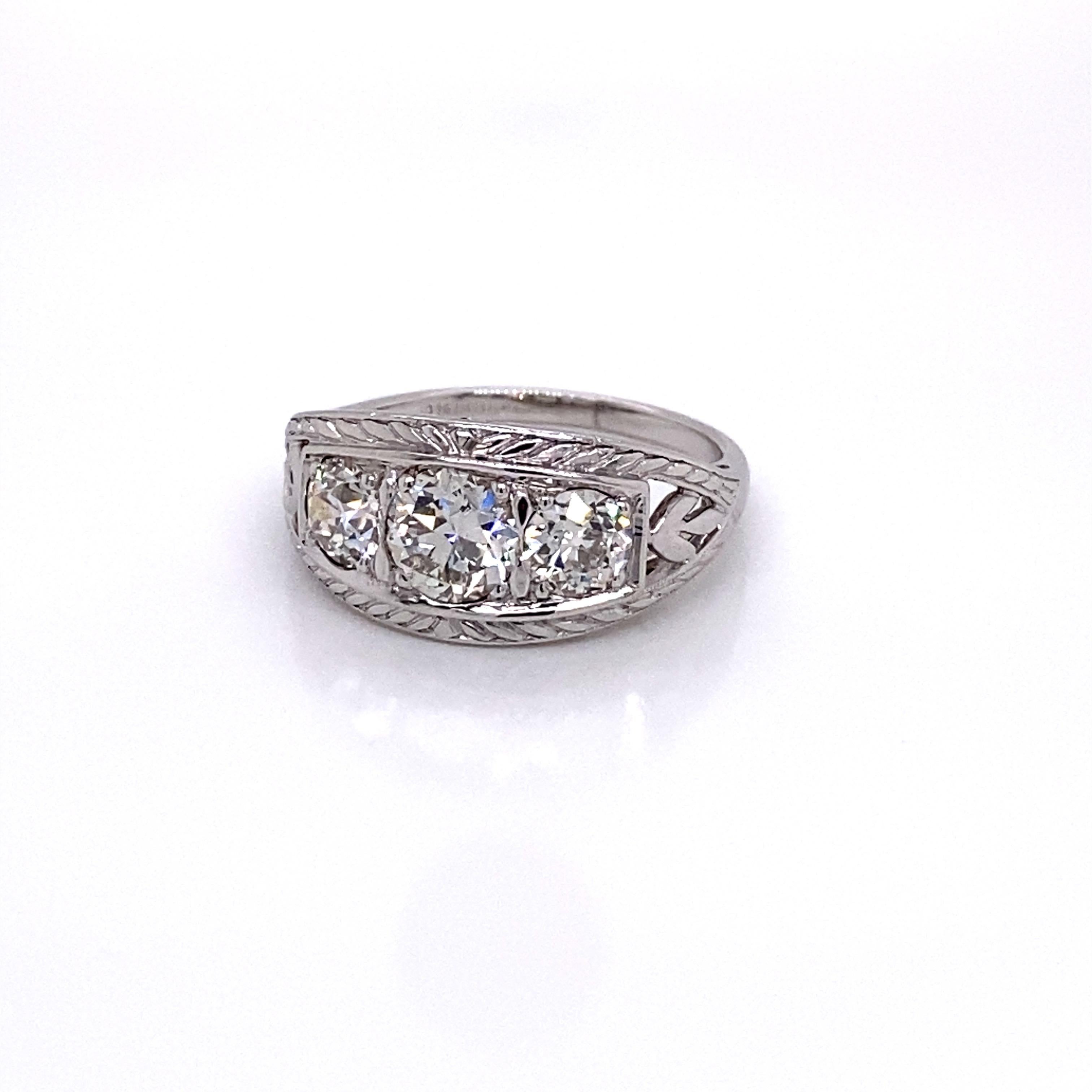 Vintage 1930s 3 Stone European Cut Diamond Platinum Ring 1.75ct - The center diamond weighs approximately .80ct and the 2 side diamonds weigh approximately .95ct. The diamonds are H-I color and SI2 clarity. They are set low in a wide tapered setting