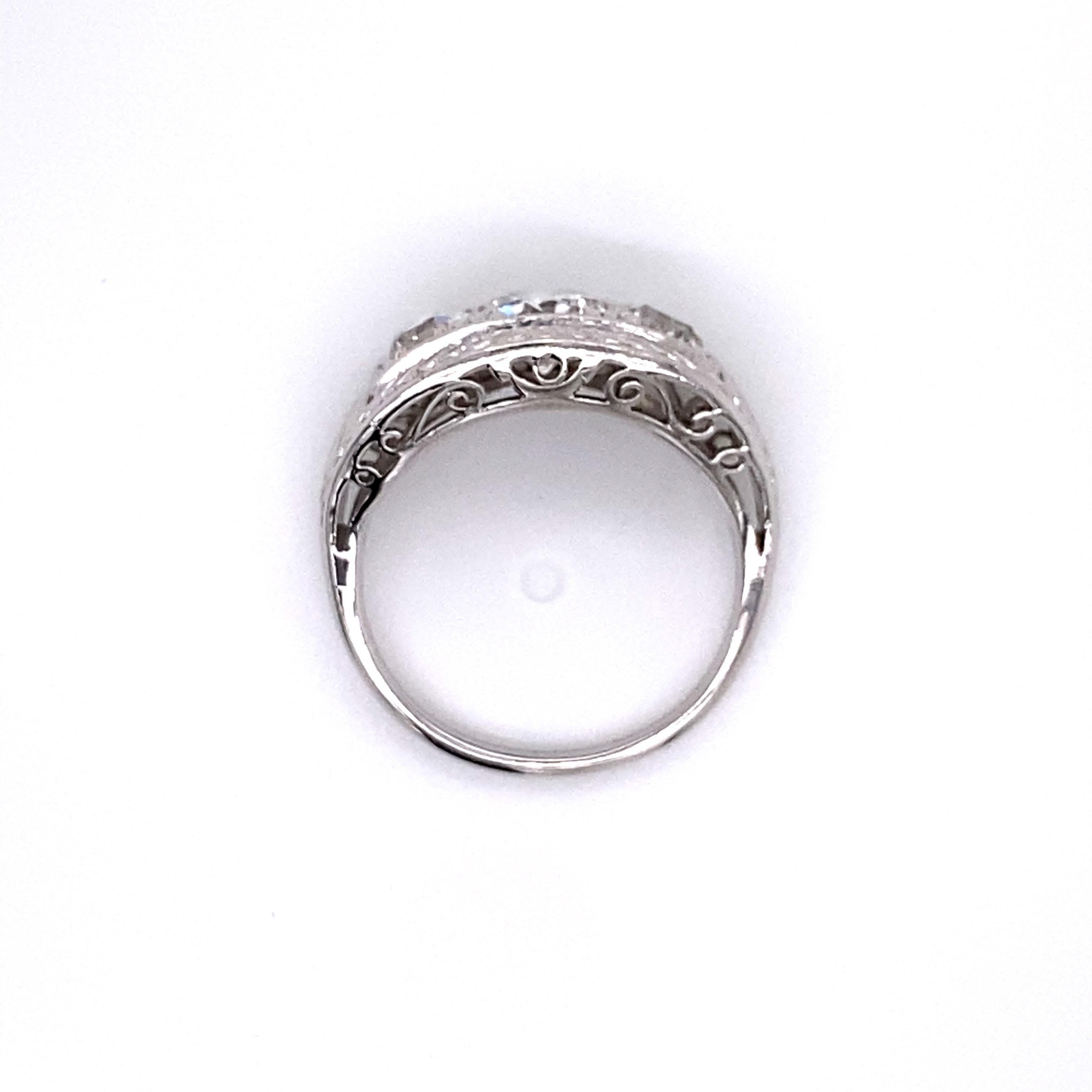 Women's Vintage 1930s 3-Stone European Cut Diamond Platinum Ring 1.75 Carat For Sale