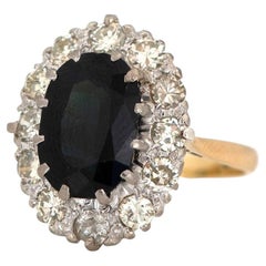 Bague vintage des années 1930, saphir 5,35 carats, diamant 1,45 carat halo, or 18 carats