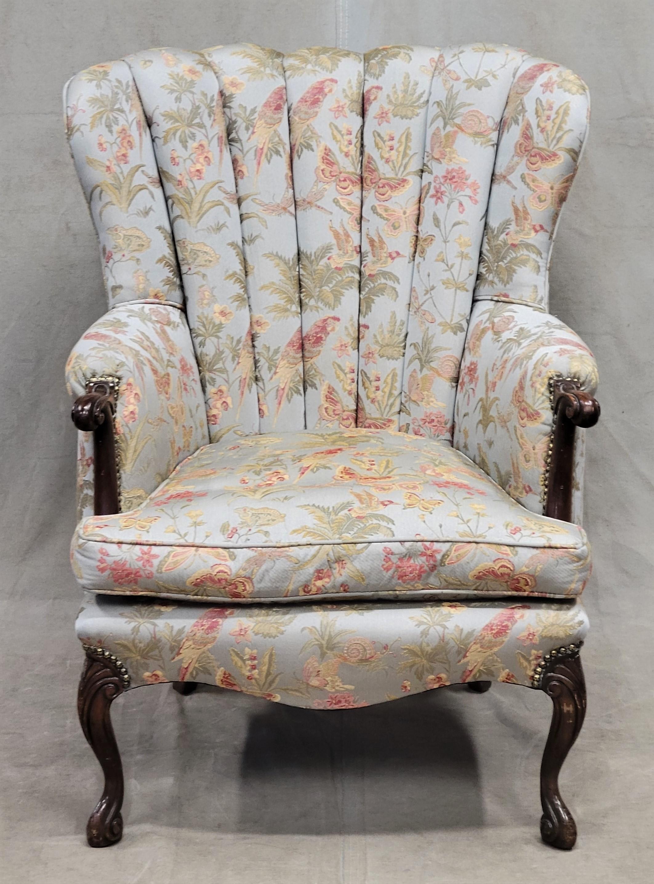What a stunning accent chair! Vintage 1930s Art Deco fan back wood frame bergere chair recently reupholstered with a gorgeous Kravet botanical damask. Parrots, snails, toads, hummingbirds, butterflies, etc. on a pale blue background. Down cushion