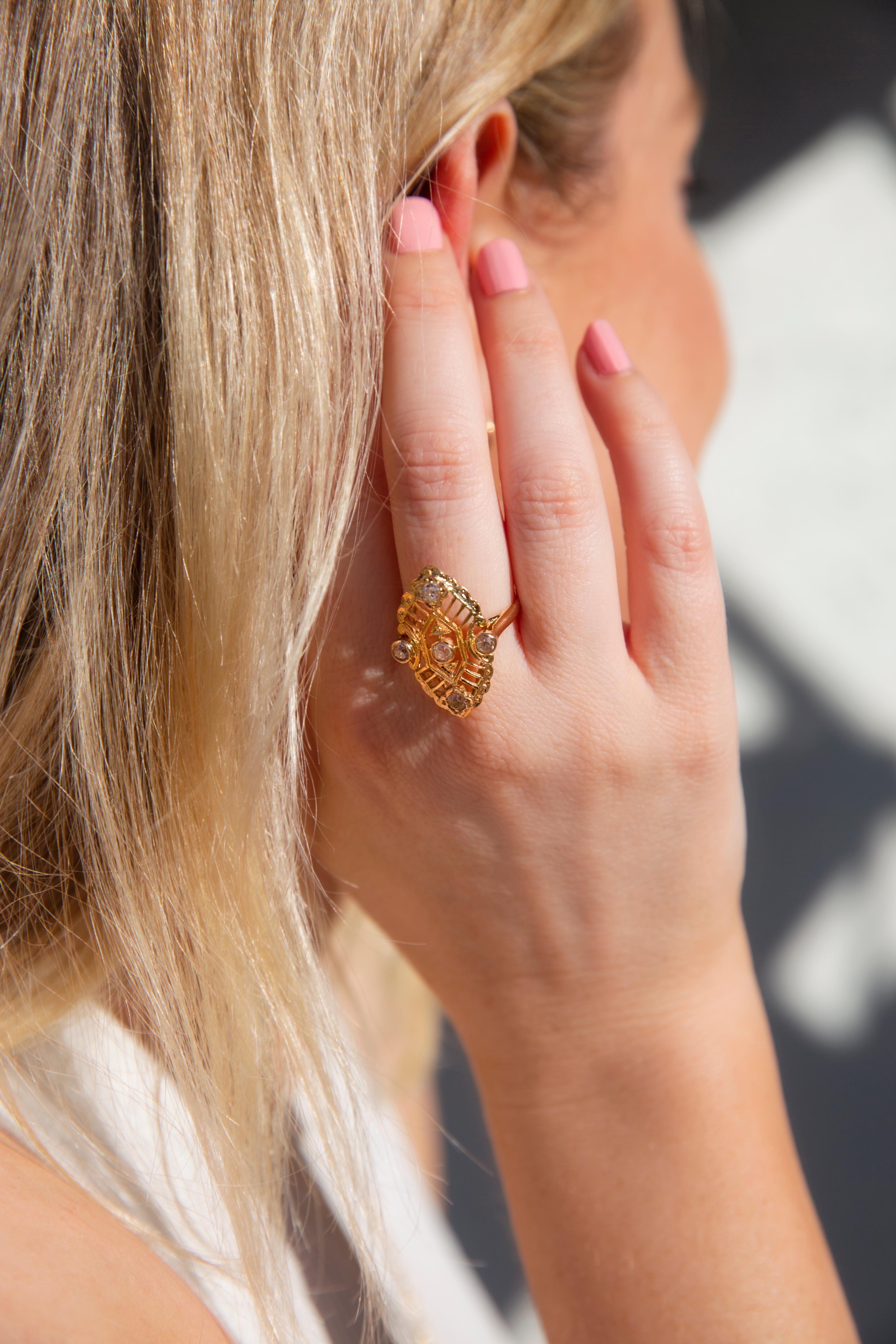 Intricately crafted in 18 carat gold, The Marcia Ring is a trip through the early years of the last century. Her geometric lines form a warrior's shield embellished with shining diamonds. She is a jewel for the one who is unafraid to stand out.

The