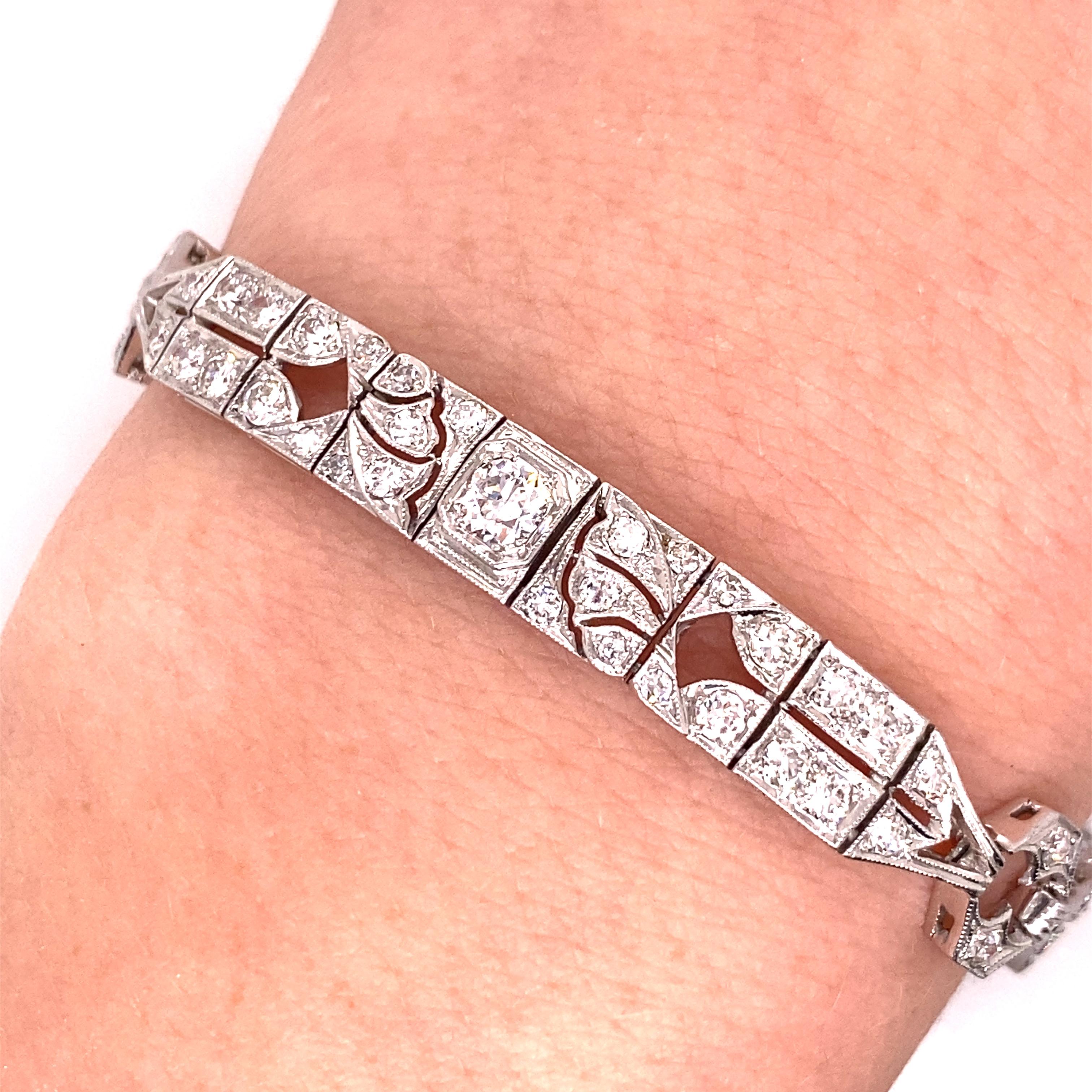 Vintage 1930's Art Deco Platinum Diamond Bracelet 3.00ct - The bracelet contains 3 European cut diamonds that weigh about .70ct total and an additional 126 smaller European and single cut diamonds that weigh about 2.30ct total. The diamonds are hand