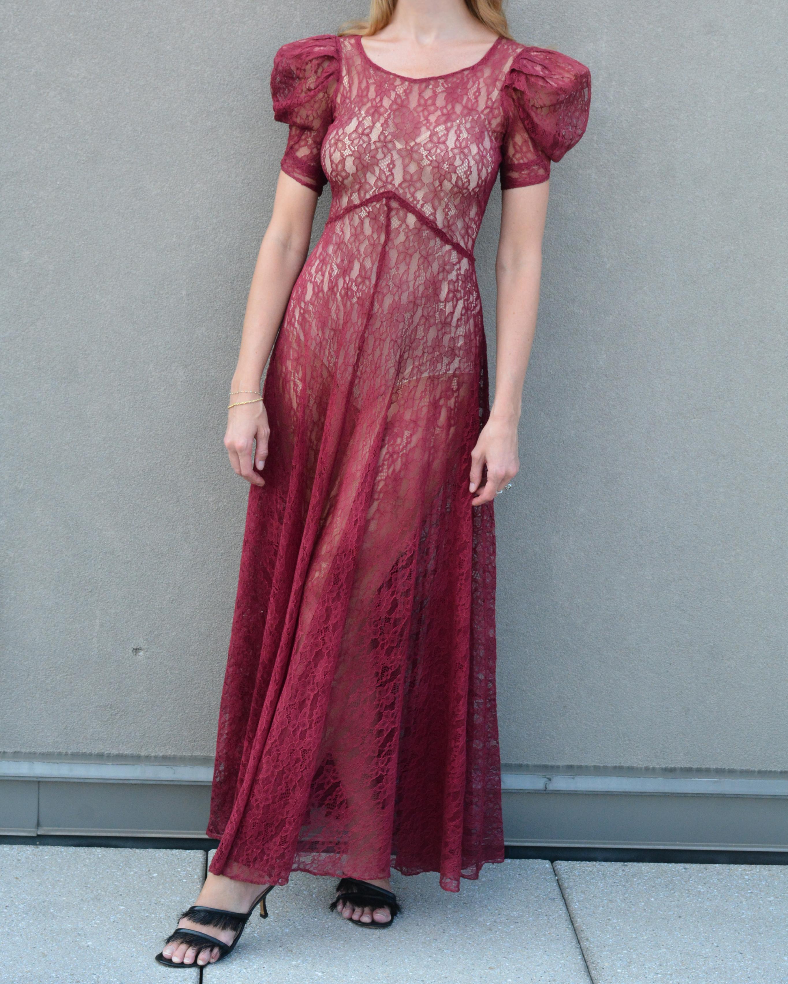 This rare vintage 1930s bias-cut lace dress is an absolutely stunning example of 1930s fashion. It is becoming increasingly (very) rare to find these 1930s lace dresses in the beautiful condition of this one. It is crafted from a breathtaking floral