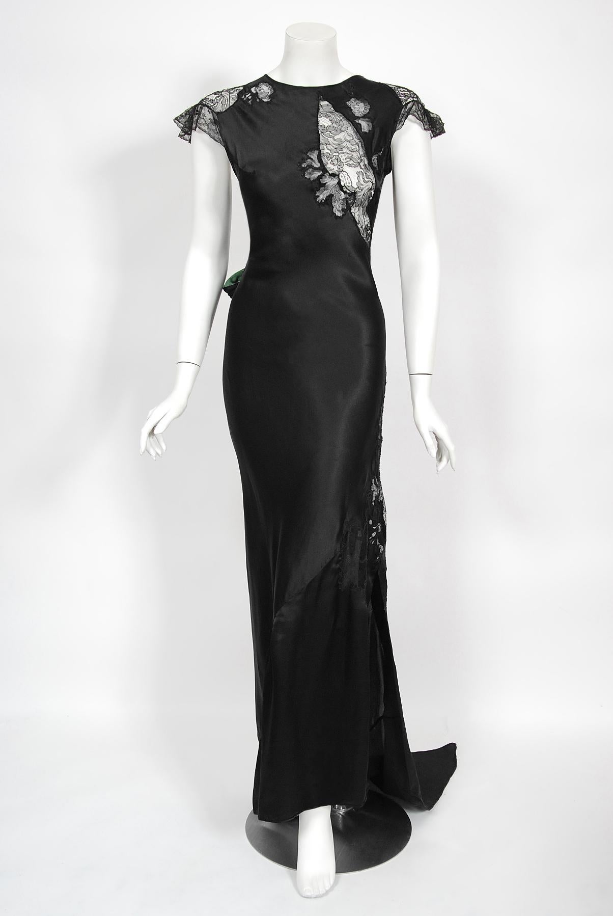 There are lots of lovely 1930's garments still around, but every once in a while I come across one that sets my heart a flutter! This is an extraordinarily beautiful black silk and fine chantilly-lace sculpted full length showstopper. Old Hollywood
