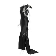Vintage 1930
s Black Silk
Sheer Lace Cut Outs Hourglass Bias-Cut Trained Gown Vintage 1930
s Black Silk
Sheer Lace Cut Outs Hourglass Bias-Cut Trained Gown
