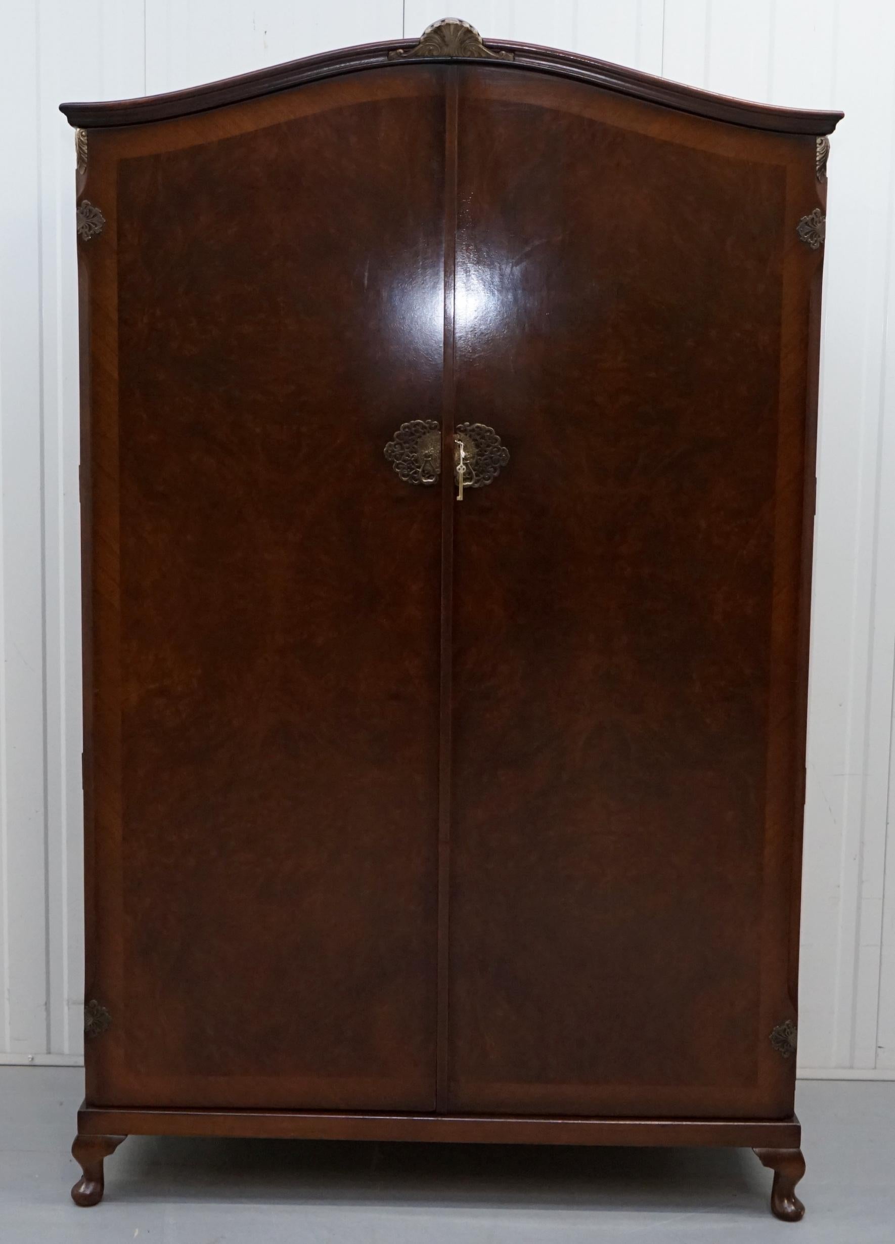We are delighted to offer for sale this lovely Burr walnut large double bank wardrobe part of a suite

This wardrobe is very large and offers lots of storage space, we had the same one at home and my wife bought a small slim chest of drawers which