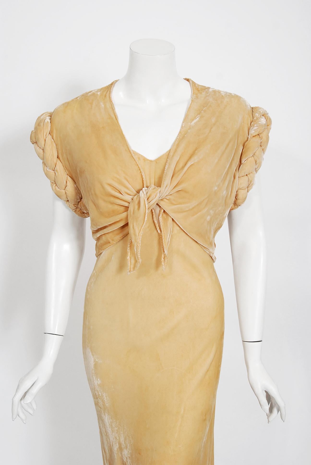 There are lots of lovely 1930's garments still around, but every once in a while I come across one that sets my heart a flutter! This is a simply beautiful 1930's butterscotch colored silk velvet bias-cut gown. Old Hollywood glamour at it's finest.