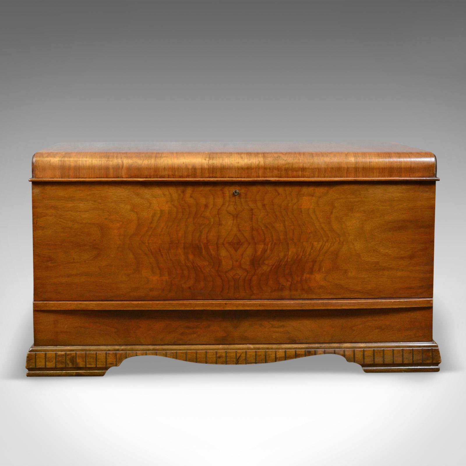This is a vintage 1930s Canadian cedar storage trunk, a blanket chest dating to the Art Deco period of the early 20th century.

Displaying fine grain detail to the cedar
Good color in a wax polished finish
Art Deco influence with a desirable