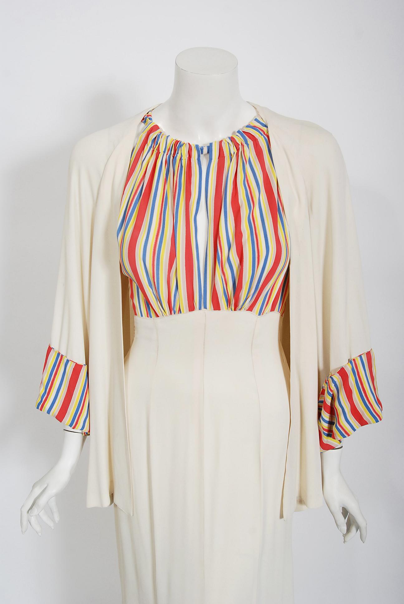 The vibrant rainbow-stripe used on this ivory silk rayon 1930's 