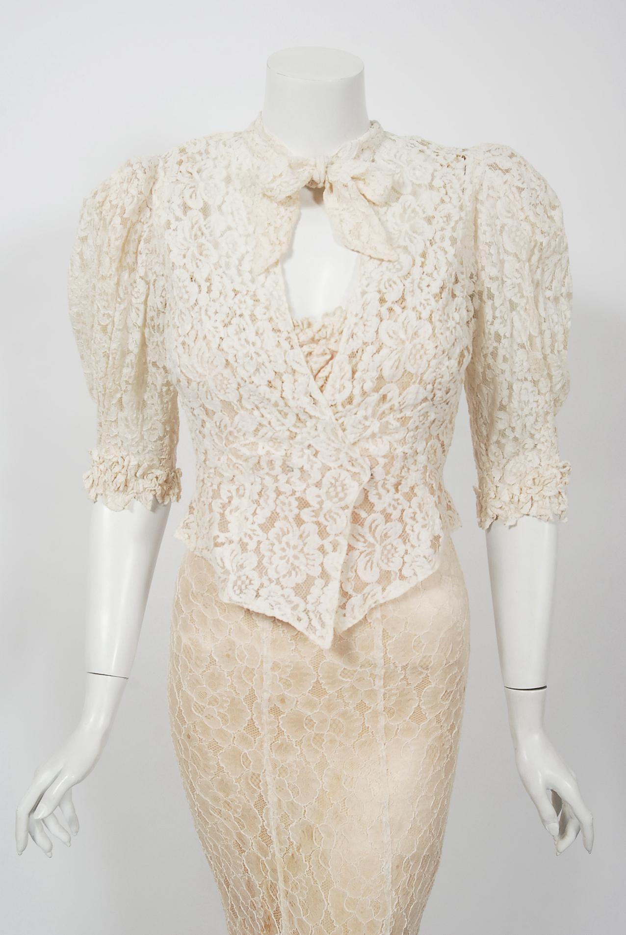 A breathtaking ivory white lace gown ensemble from the 1930's era of 
