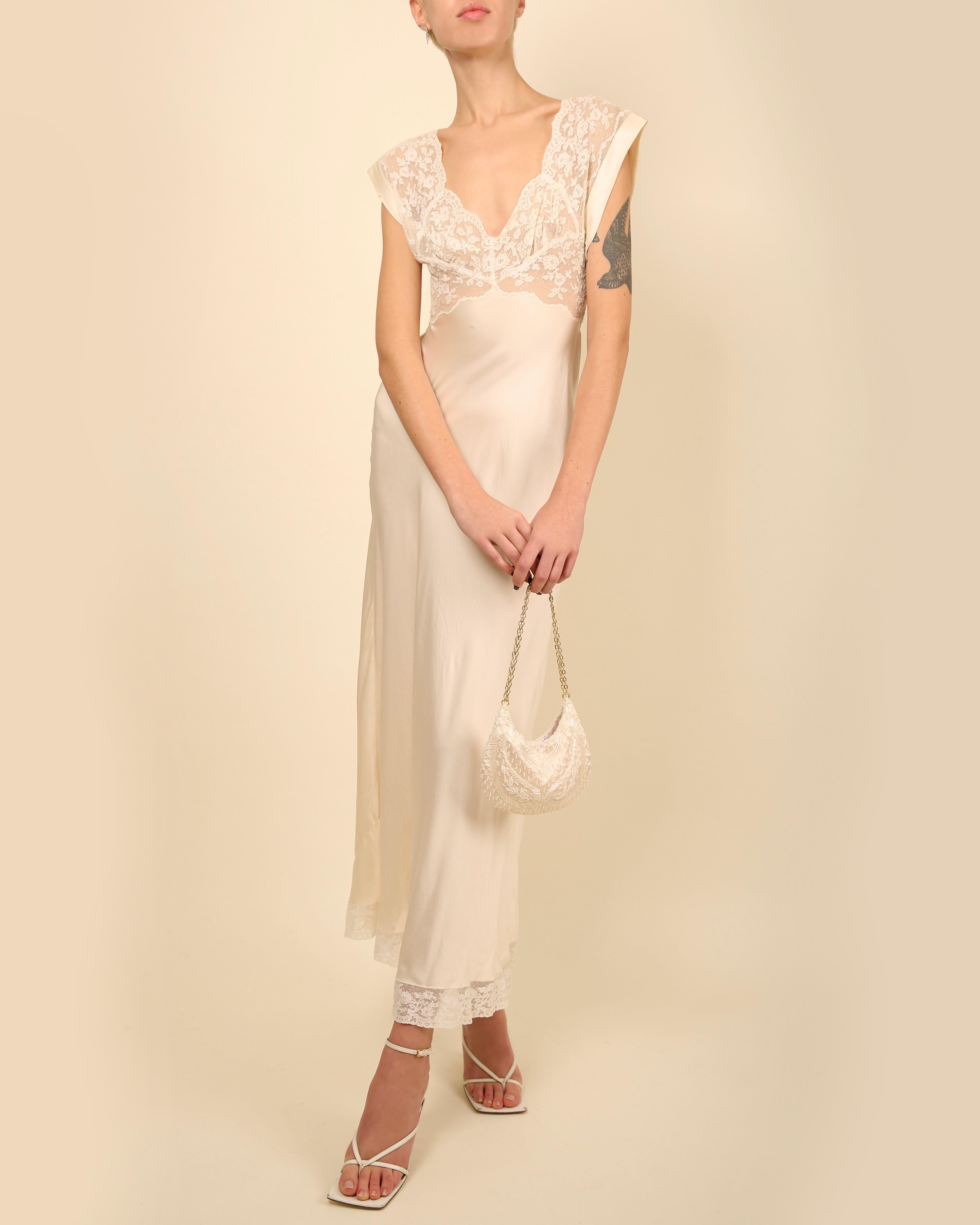 A very rare vintage night gown from Heavenly Silk Lingerie by Fischer 
Circa 1930's
Cream silk maxi dress with white floral lace bust and hem
The bust is semi sheer so to wear this as an evening dress you could opt for a white lace bra underneath or