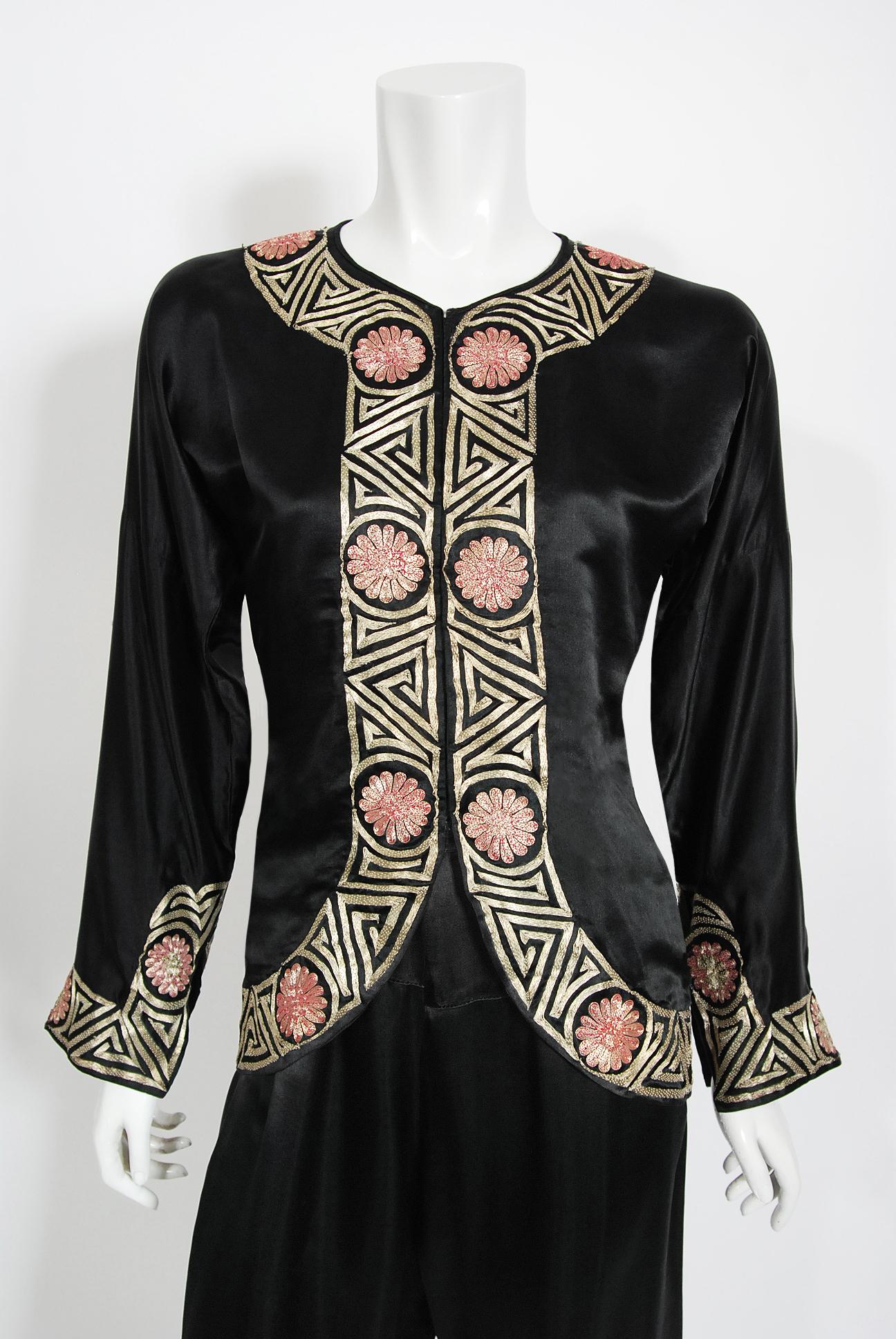 A truly exceptional embroidered black silk lounge ensemble dating back to the late 1920's-early 1930's time period. The fabric itself is a masterpiece; rare metallic gold Chinese couching embroidery on the softest black silk. I adore the pale-pink