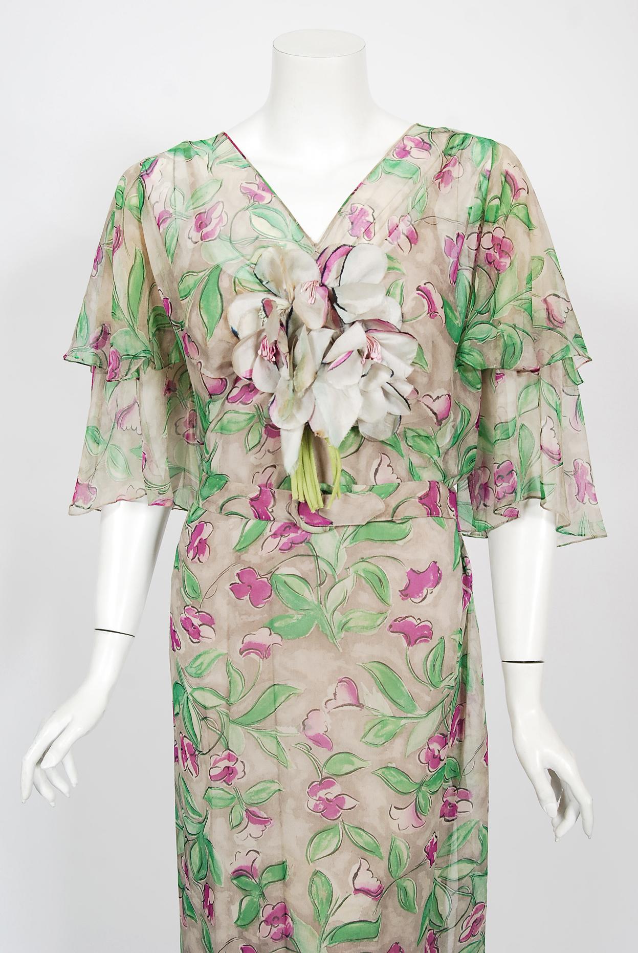 A gorgeous and highly collectable Fashion Originators Guild silk chiffon gown ensemble dating back to the mid 1930's. The Guild was organized in 1932 to protect its members from 'piracy,' which they said was an unfair and tortious invasion of their