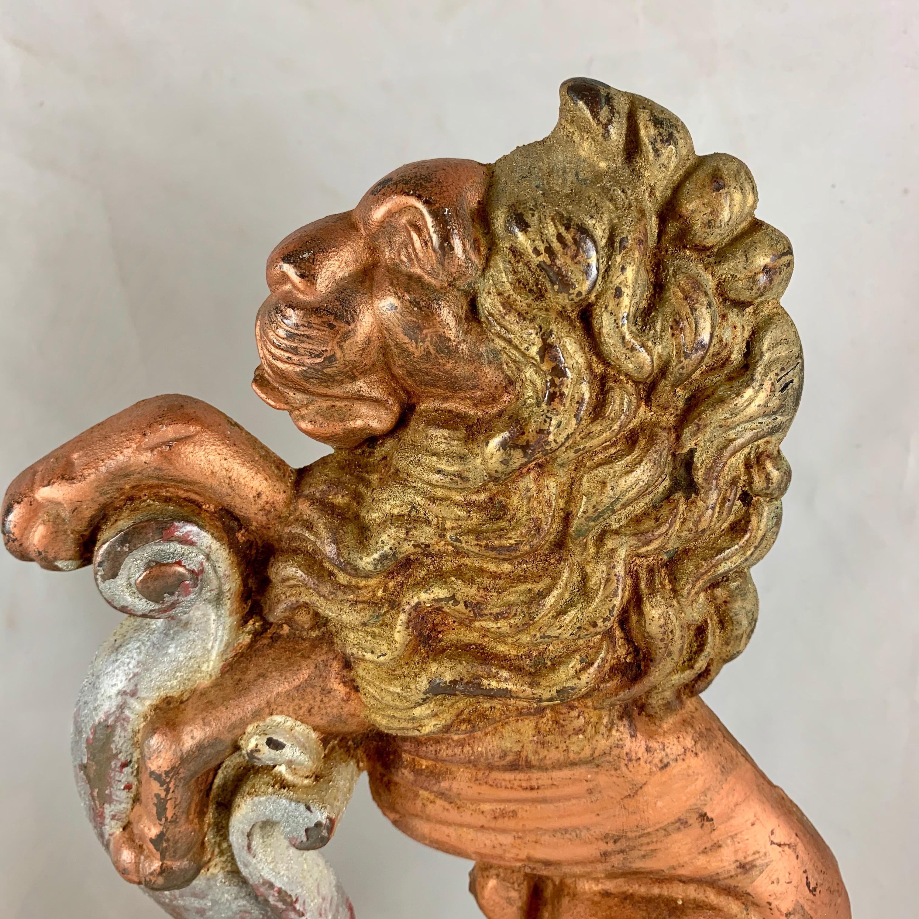Vintage 1930s French Gilded Cast Iron Heraldic Lion Doorstops or Bookends a Pair In Good Condition In Philadelphia, PA