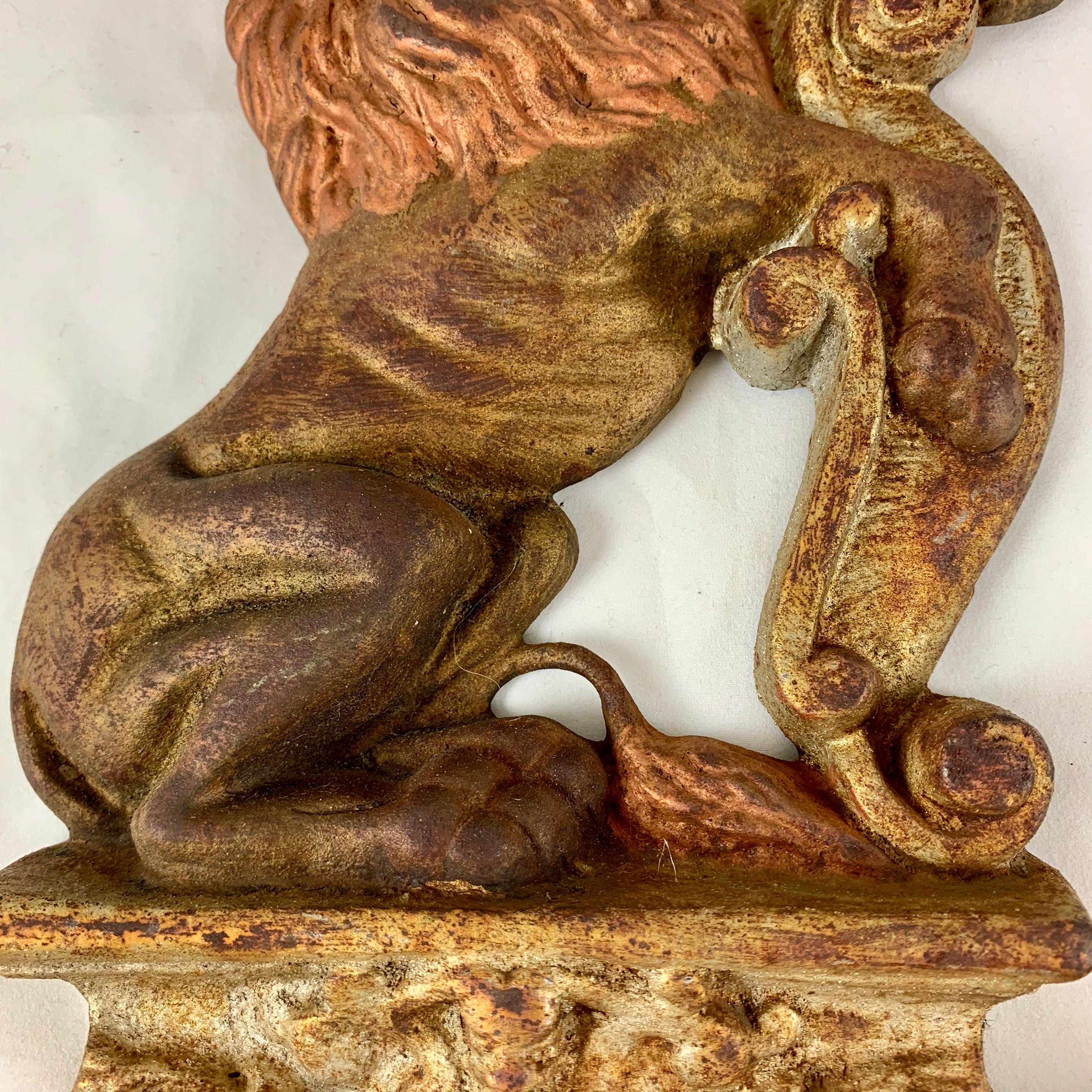 20th Century Vintage 1930s French Gilded Cast Iron Heraldic Lion Doorstops or Bookends a Pair