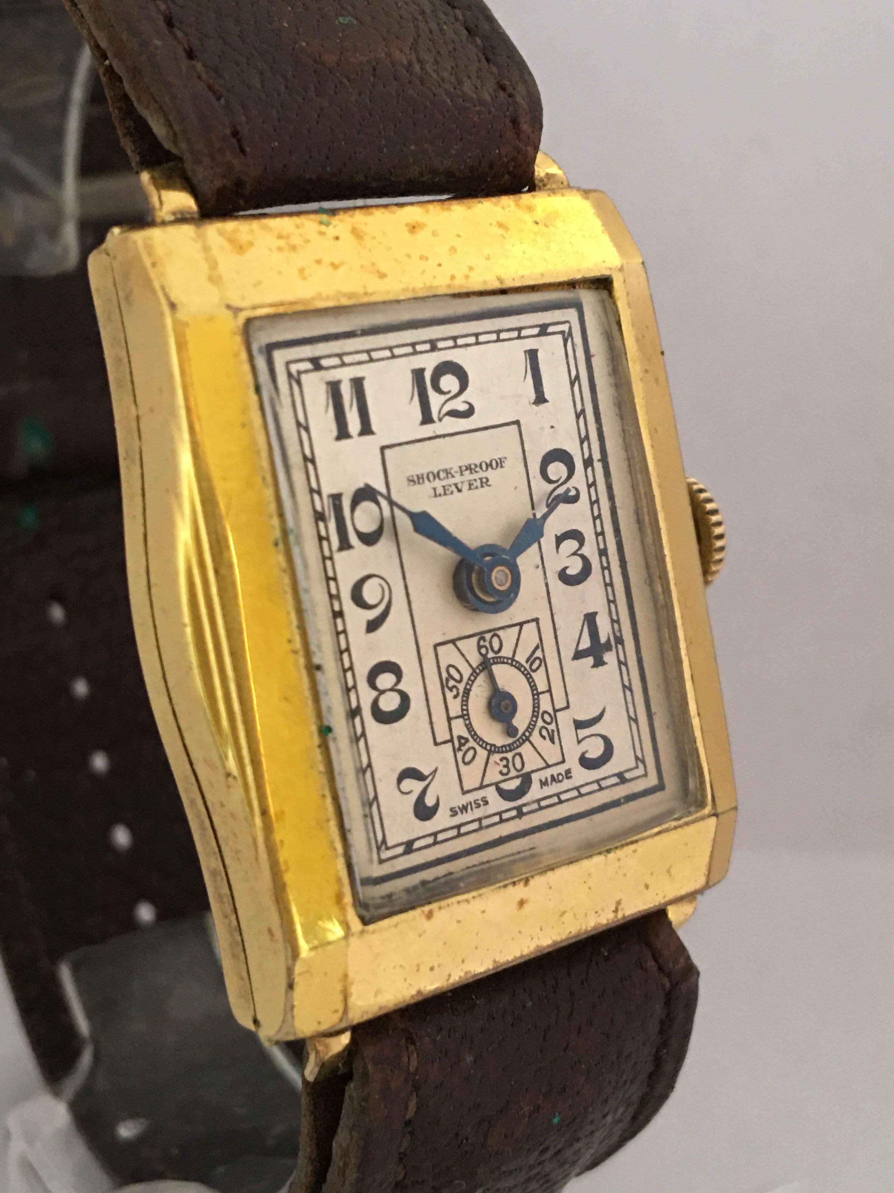 This beautiful pre-owned hand winding watch is in good working condition and it is ticking well. Visible signs of ageing and used with light marks on the glass and on the watch case as shown. The gold plated watch case has some tarnish and blemishes