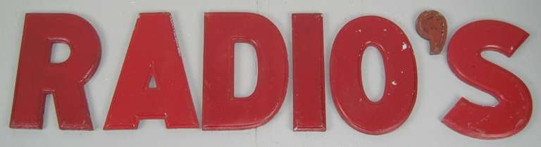 A variety of red painted vintage lettering by Wagner Sign July 21, 1936 Measuring 9-7/8 in high the M is 8.75 in wide, The I is 2..75 in wide. The following is a breakdown of all the letters, A-2, D-1, E-3, G-2, I-5, M-1, N-3, O-2, P-1, R-2, S-1,