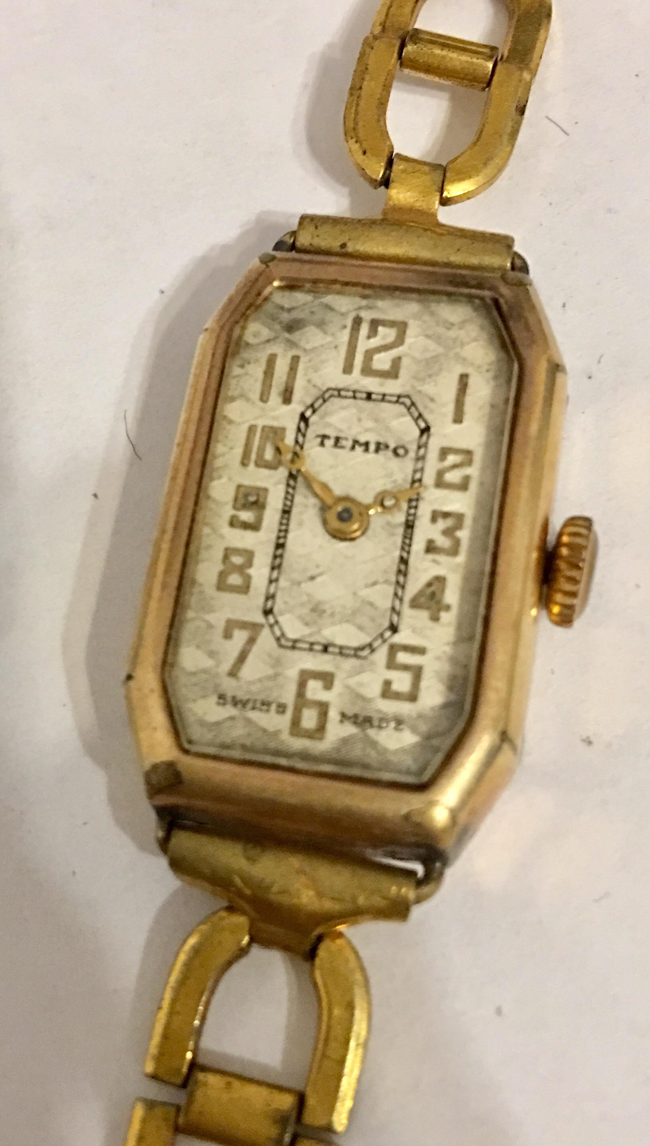 This beautiful watch is working and is ticking well. Dial is a bit tired. Watch case and the rolled gold strap is a bit tarnished as shown. 

Please study the images carefully as form part of the description 