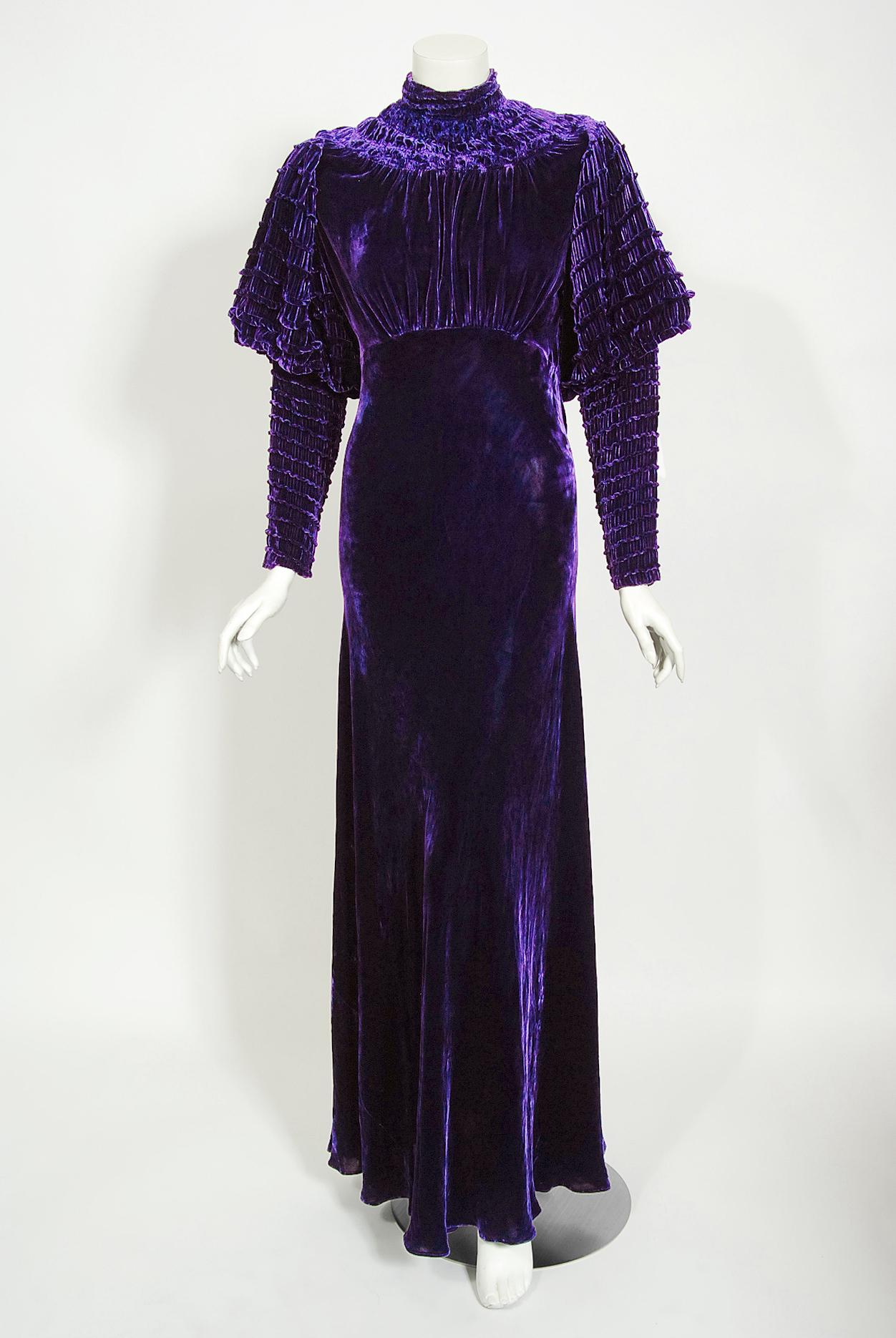 There are lots of lovely 1930's garments still around, but every once in a while I come across one that sets my heart a flutter! This is an extraordinarily beautiful and exceptional museum quality 1930's royal purple silk velvet bias-cut gown. Old