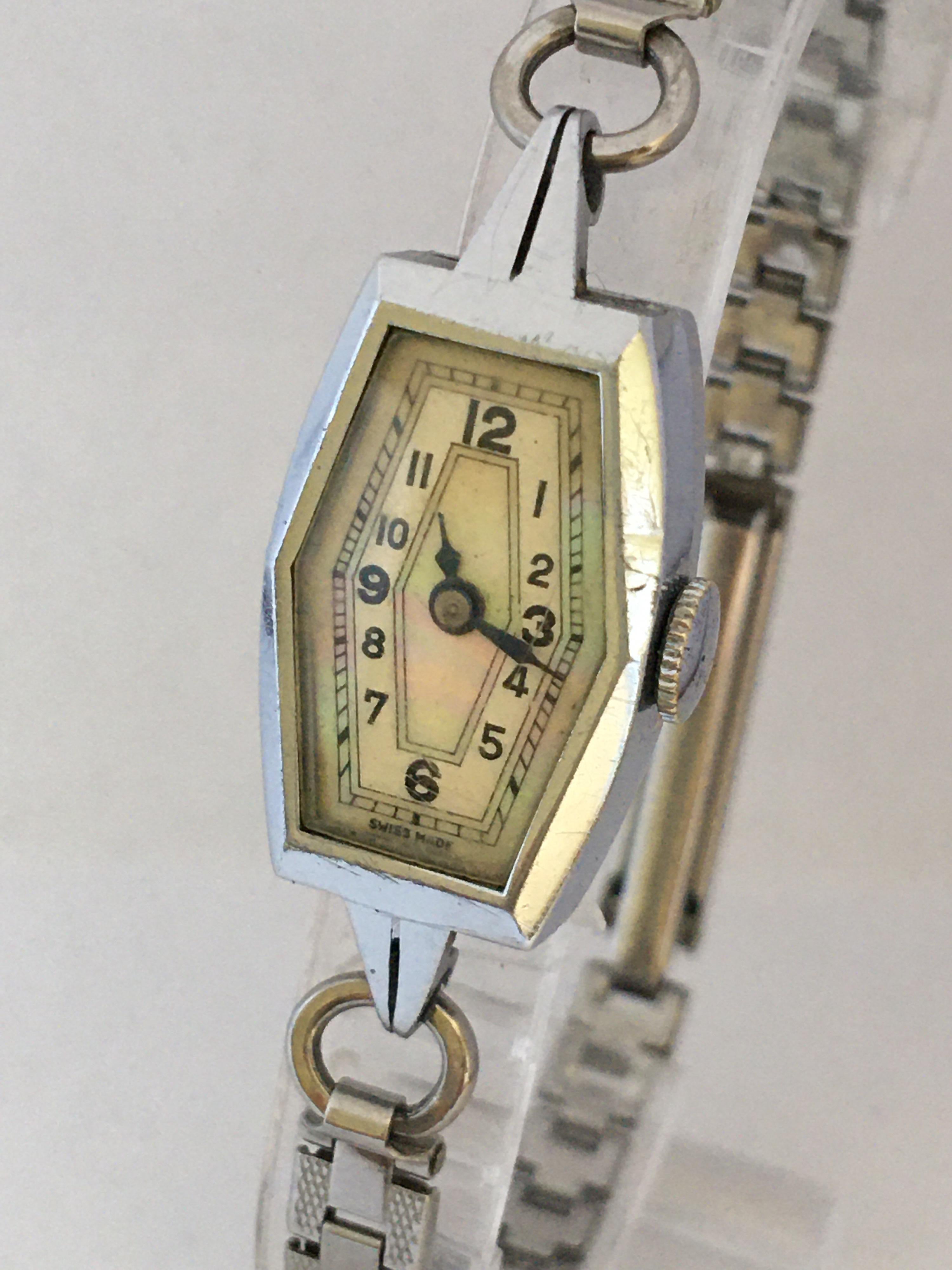 This beautiful vintage hand winding mother pearl dial ladies watch is working and it is ticking well. visible signs of ageing and wear with tiny scratches on on the watch strap and watch case. 

Please study the images carefully as form part of the