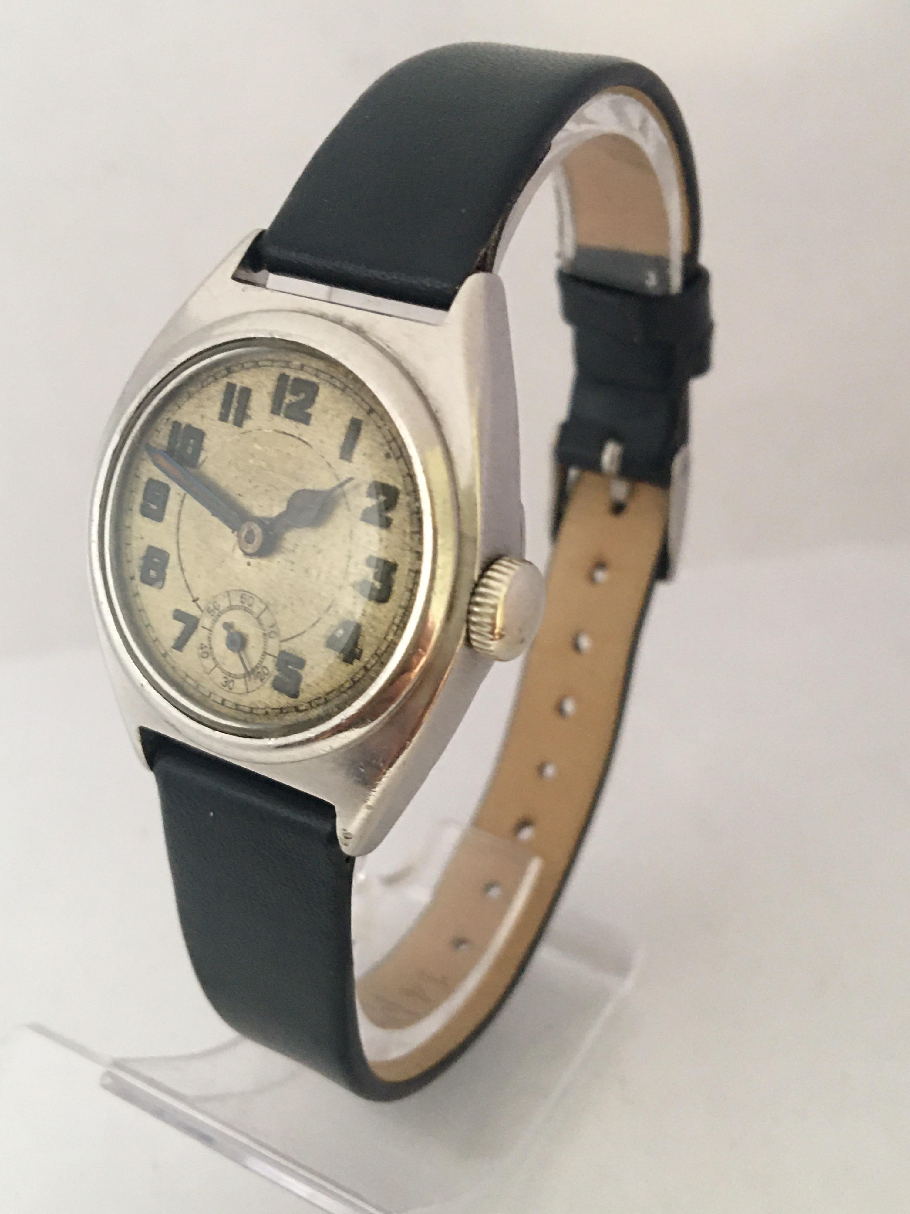 This beautiful pre-own 30mm vintage hand-winding watch is good working condition and it is running well.  The dial is a bit worn. Some scratches on the watch back case and the Bessel as shown. 

Please study the images carefully as form part of the
